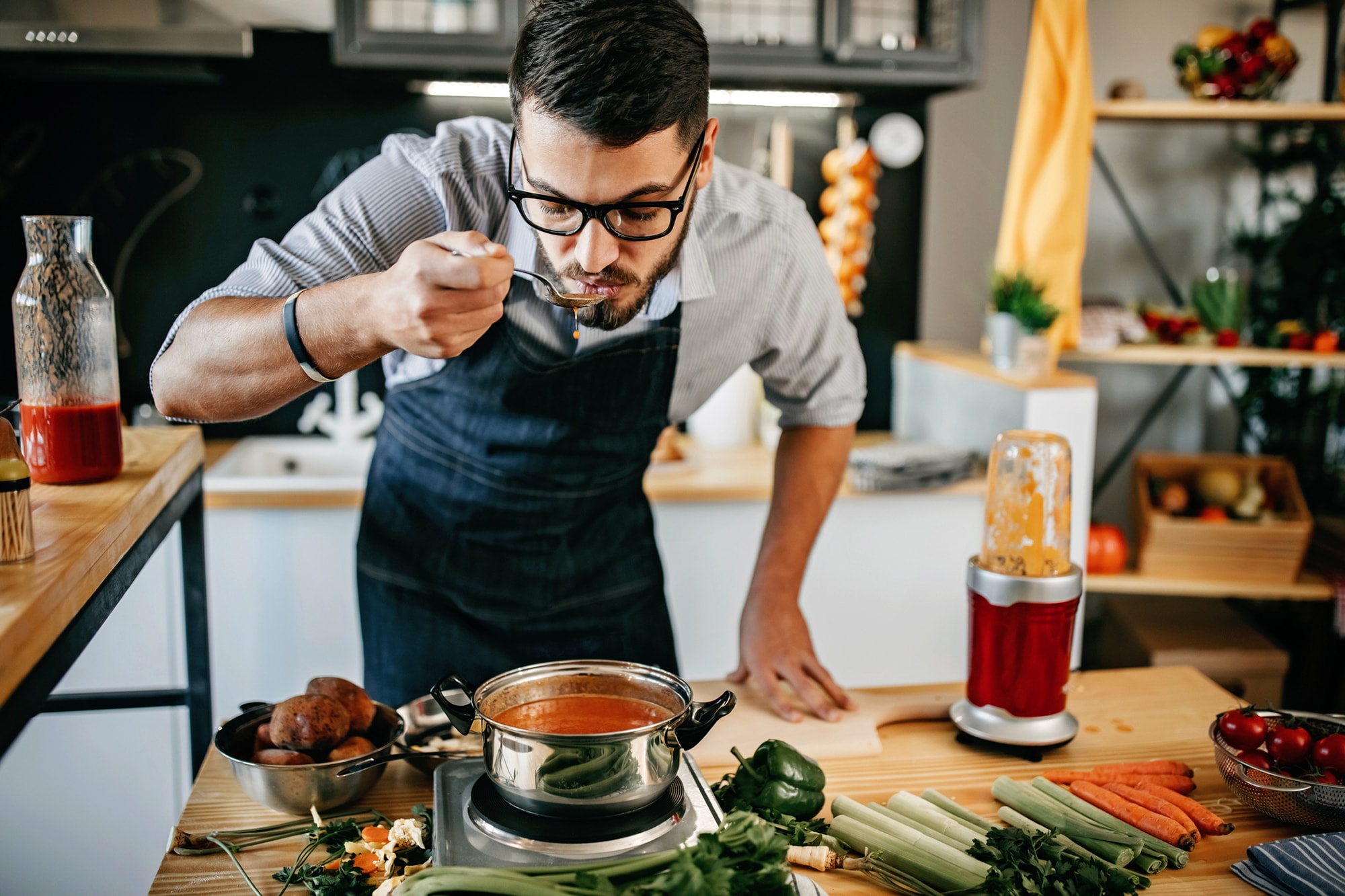 Man trying plant-based cooking